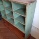Old library shelf in patinated grocery tree