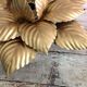 Flower metal sconce