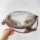 Old wrought iron mirror in the art deco style and period