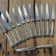 Set of 12 silver-plated metal knives with steel blades from the early 20th century