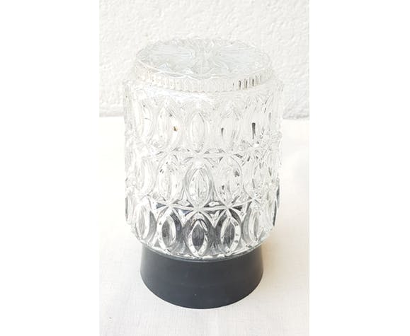 Chiselled glass ceiling and black bakelite base