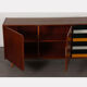 Oak sirdeboard with yellow and black drawers by Jiri Jiroutek, 1960