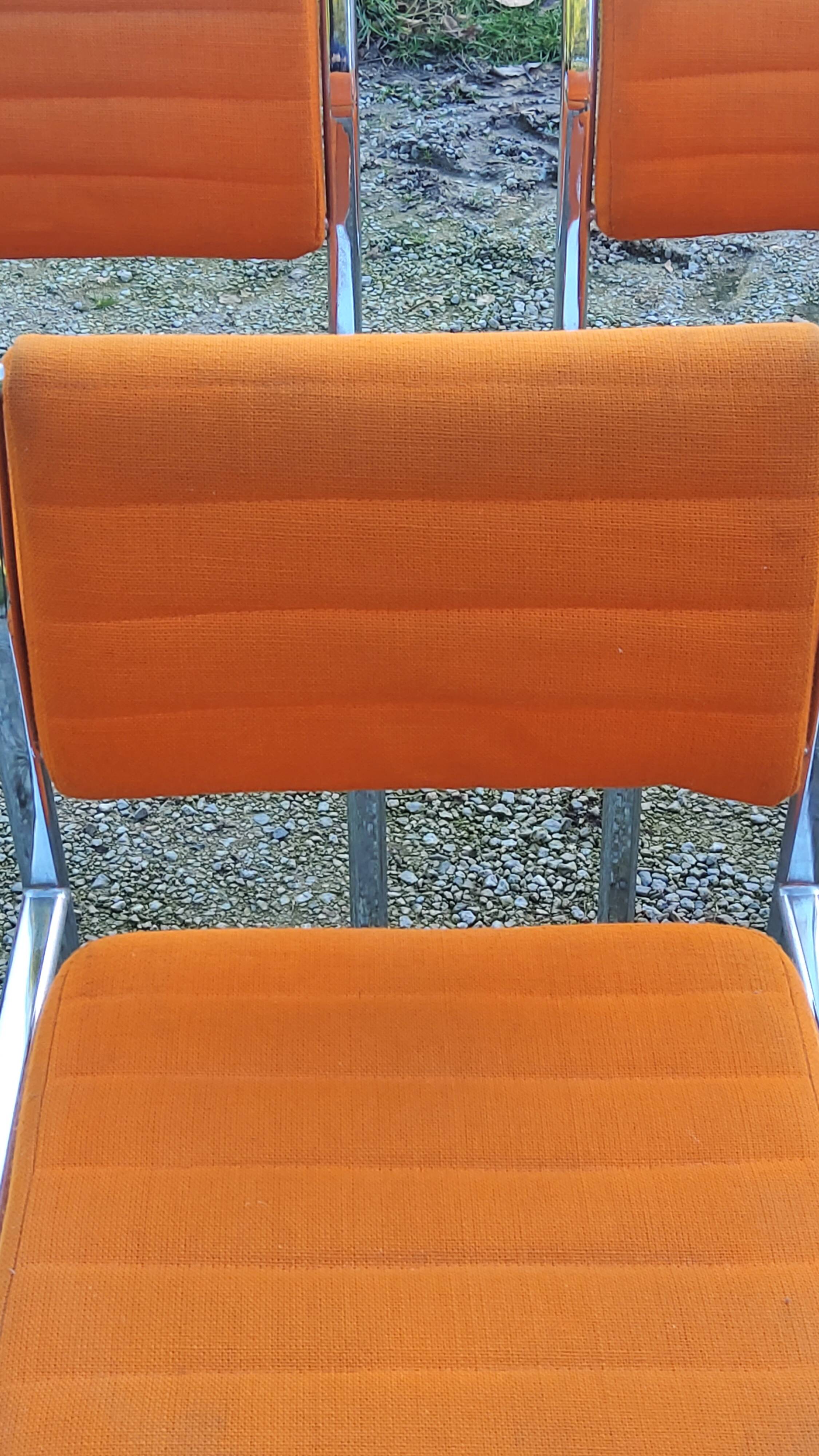 Set of 6 designer chairs from the 70s orange fabrics and chrome tubes