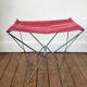 Tabouret pliant en toile rouge à rayure