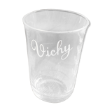 Vichy curist glass graduated in his leather and straw bag