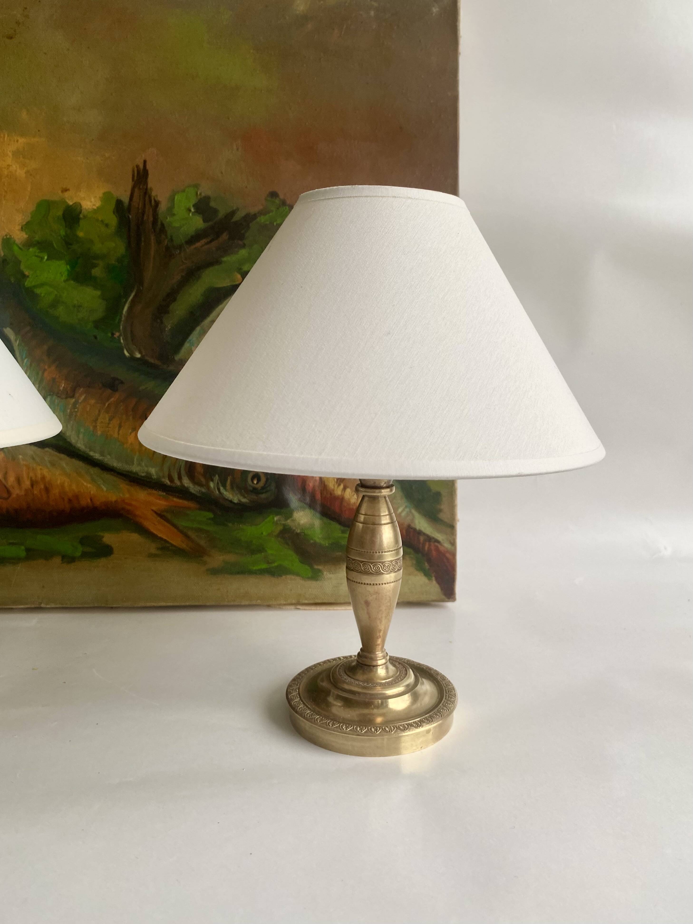 2 brass lamps