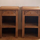 Pair of antique bedside tables / nightstands in raw solid oak.