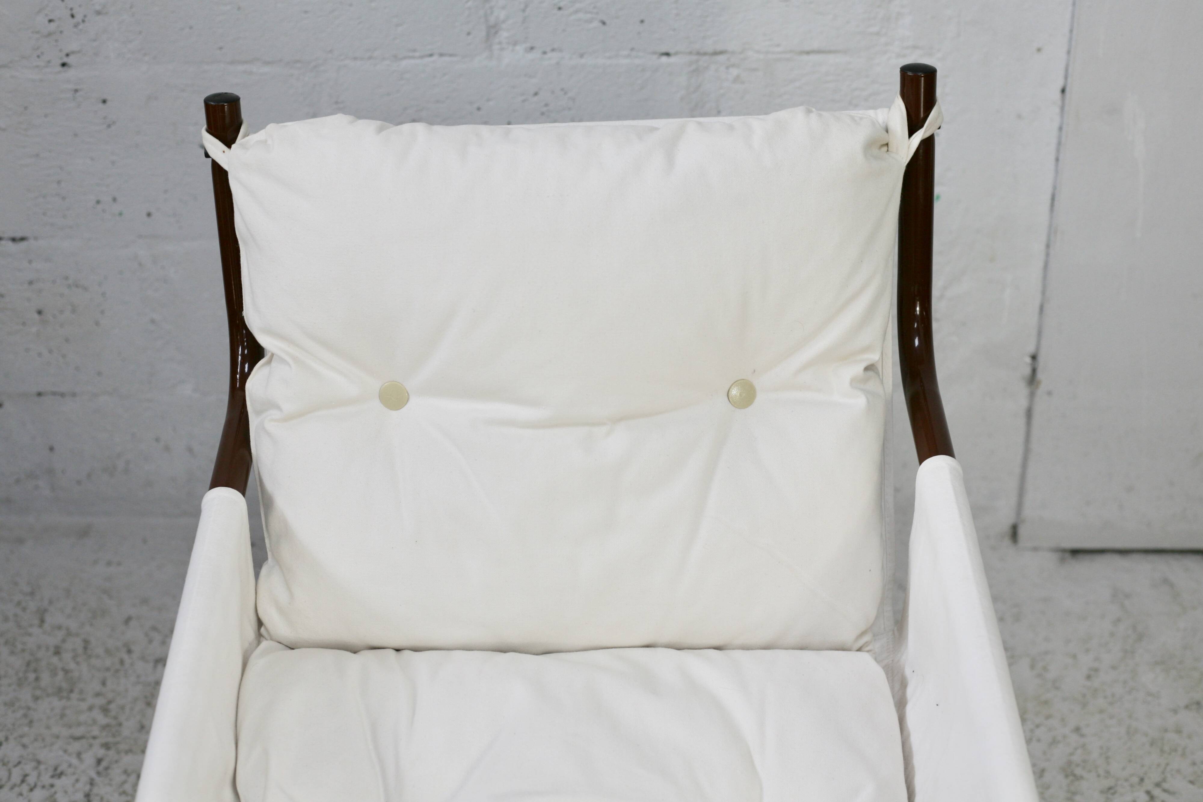 Tubular armchair, fabric suspended seat. Circa 1970