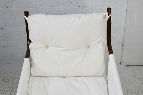 Fauteuil tubulaire, assise suspendue tissus. Circa 1970