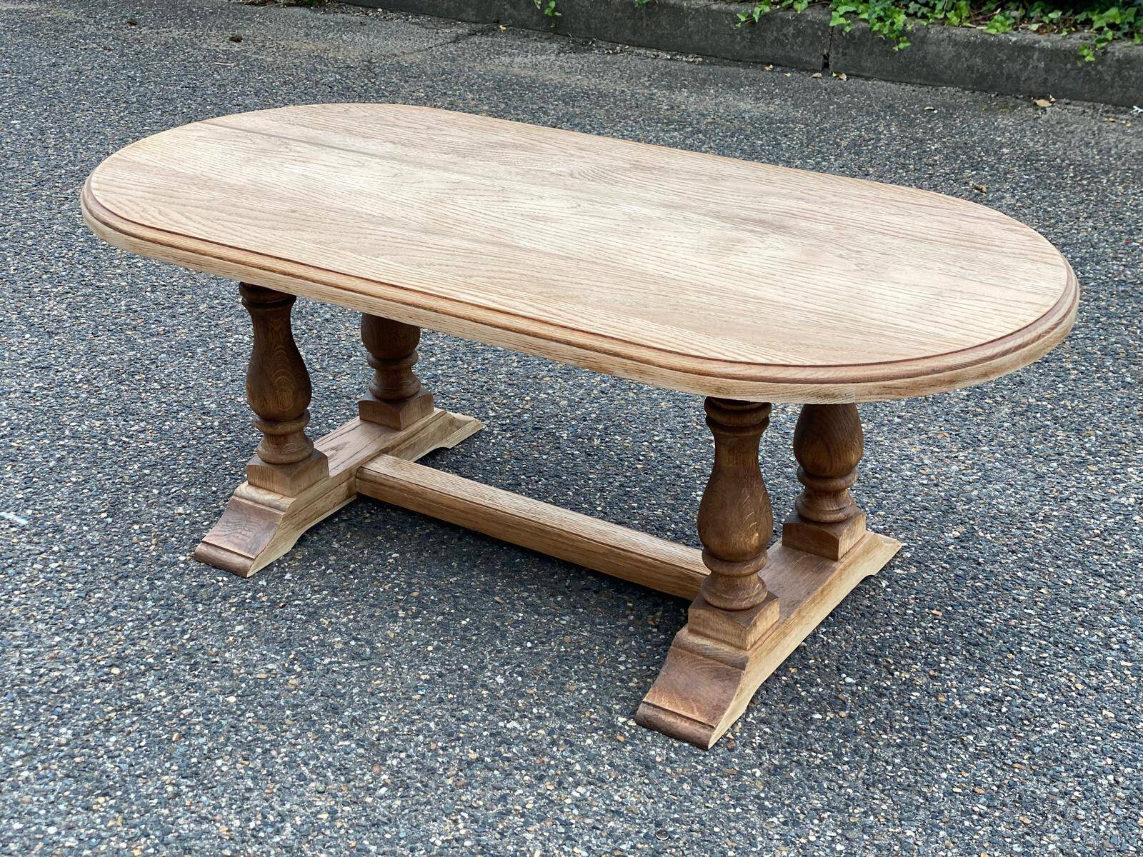 Renovated oval farmhouse or monstera coffee table in raw solid wood