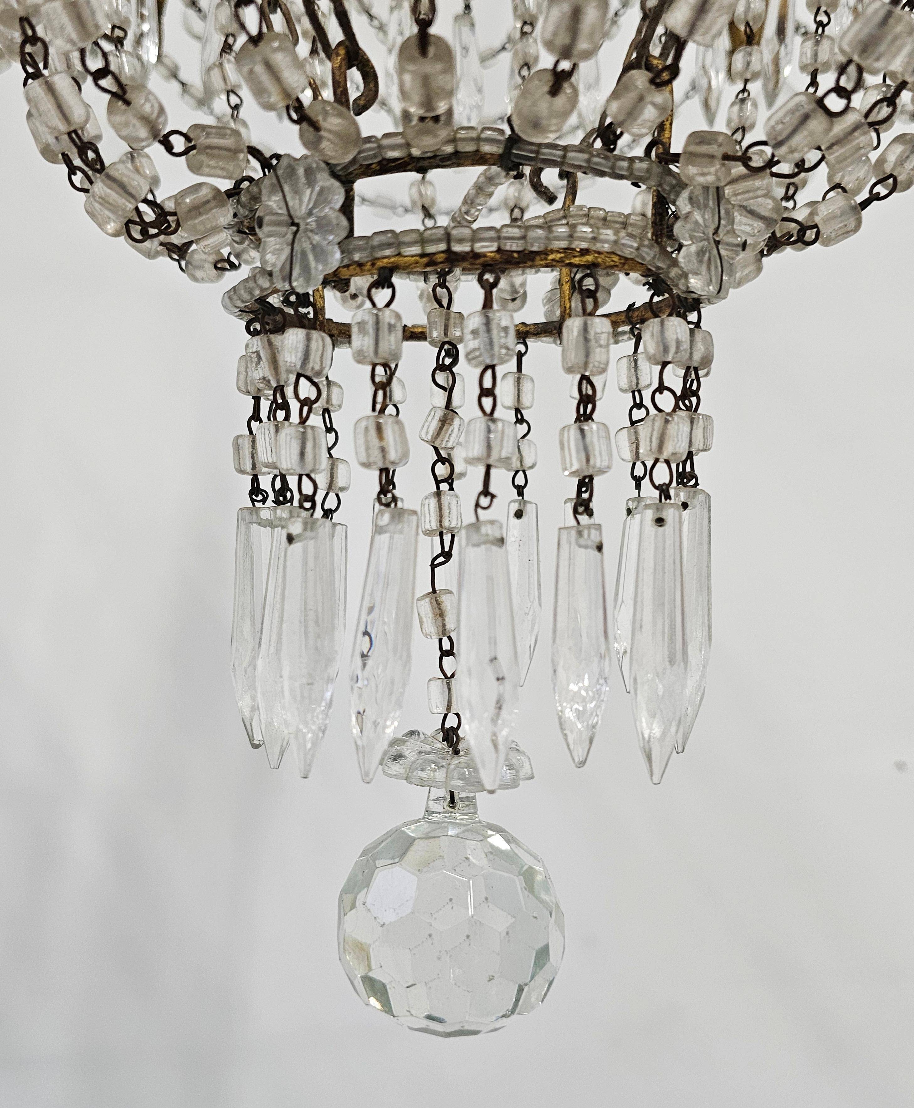 Antique crystal chandelier with floral details 1910