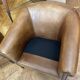 pair of camel leather club armchairs