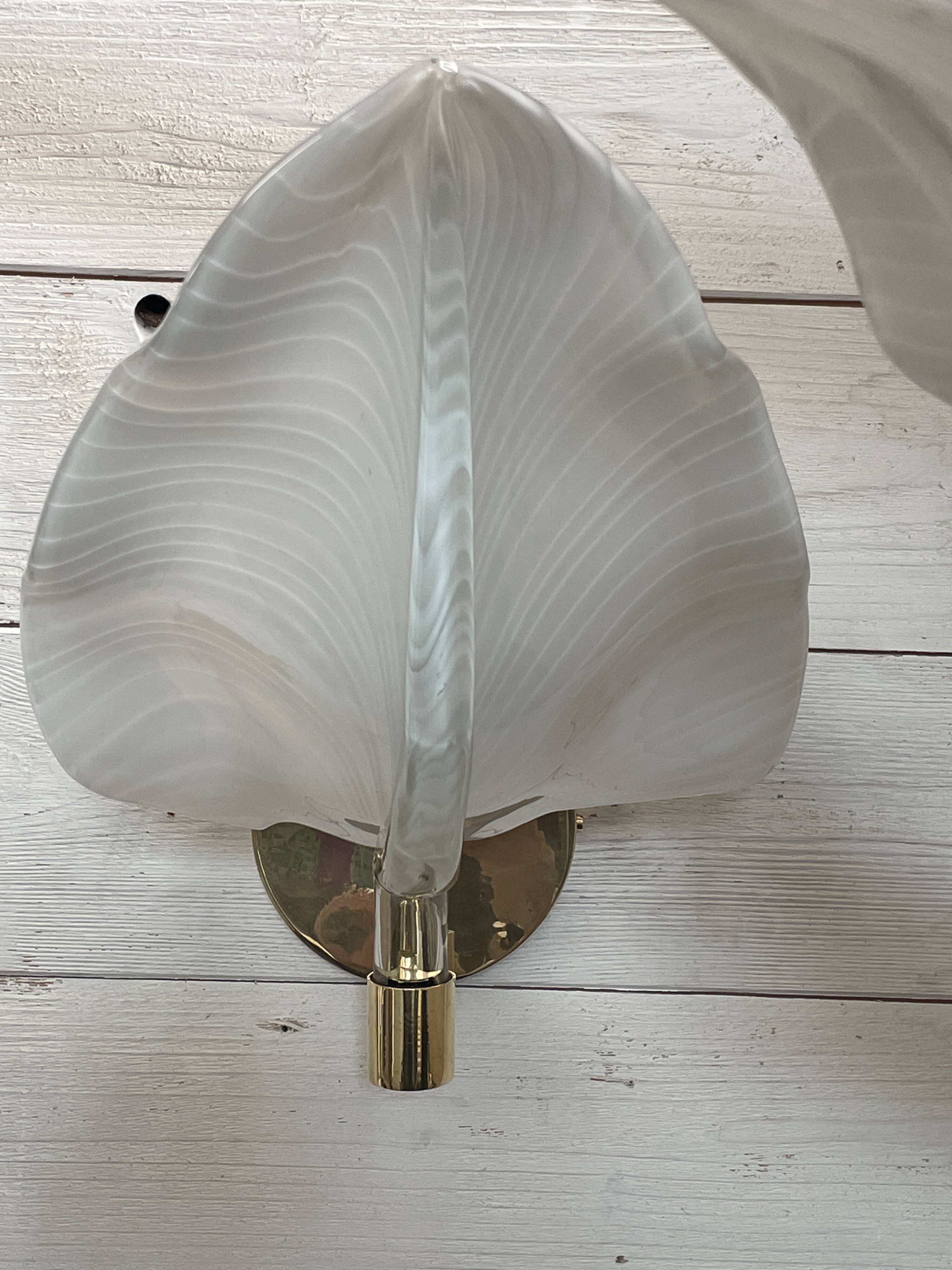 Set of 3 Murano glass wall lamps in white and brass, 1970s.