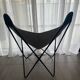 Fauteuil papillon en similicuir en parfait état