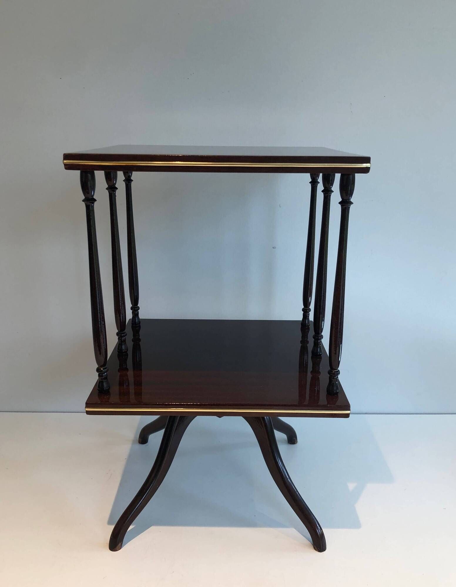 Rotating Table with Two Mahogany and Brass Platforms with Turned Columns.