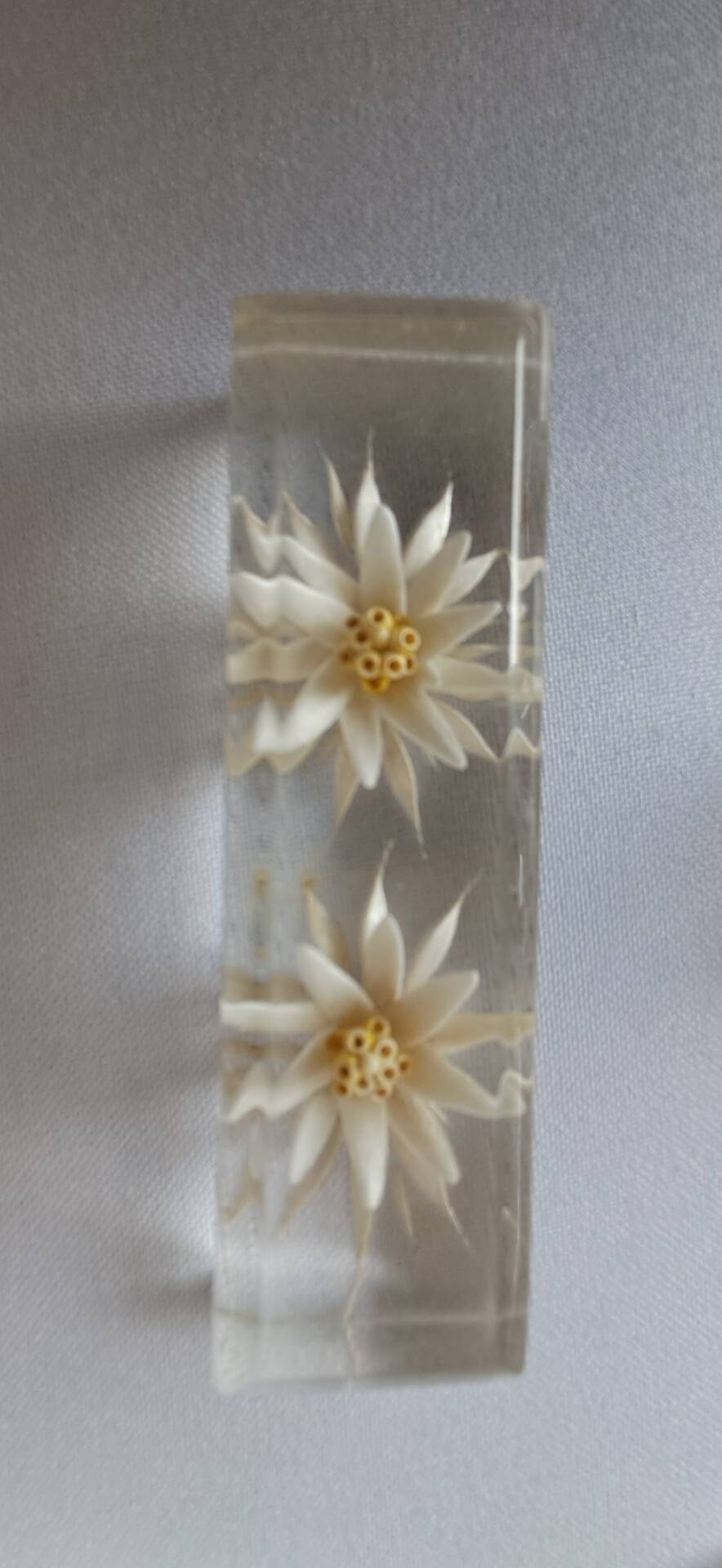 12 knife rests with resin inclusion. 1970s.