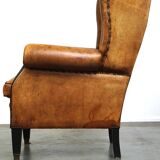Sheepskin leather chair with a beautiful patina