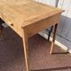 Vintage wooden desk with two drawers.