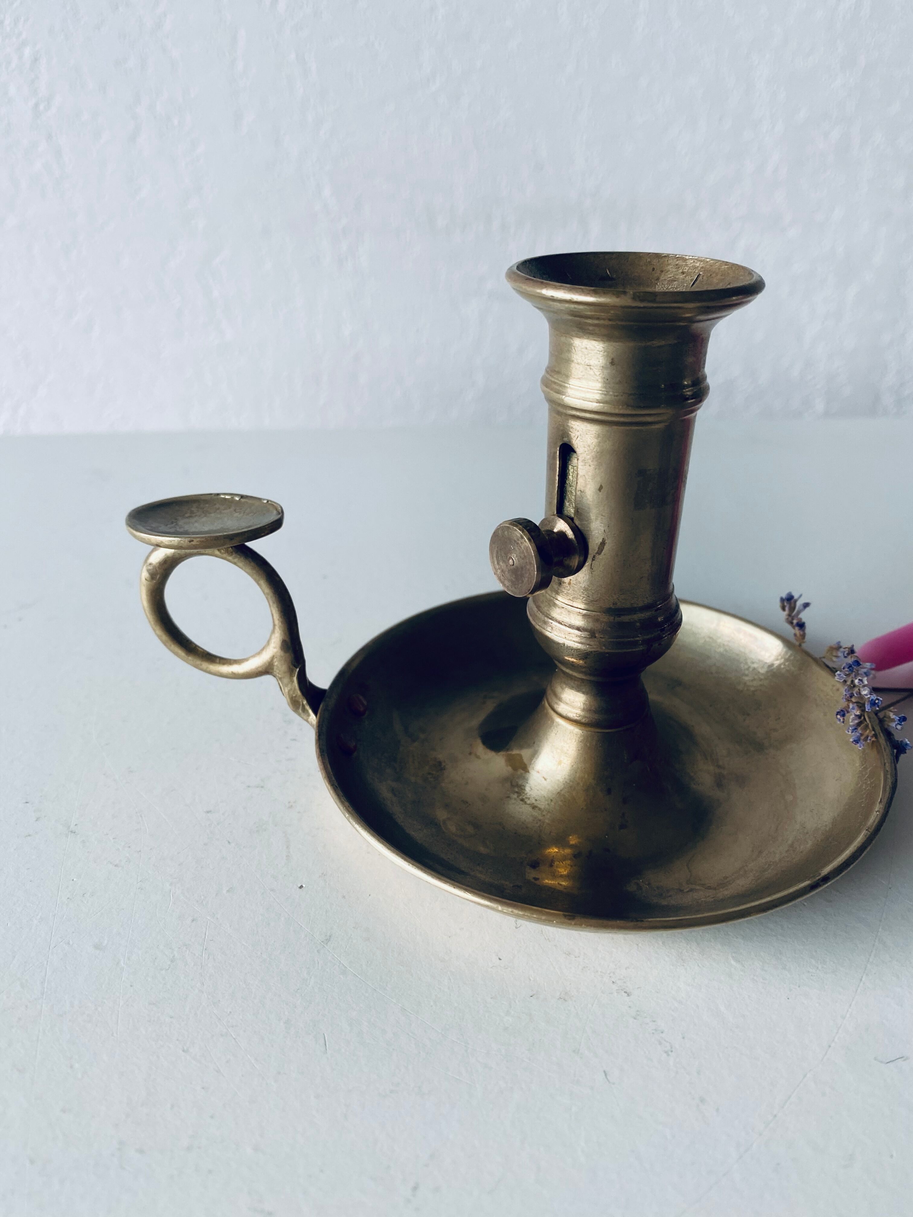 Antique brass candle holder