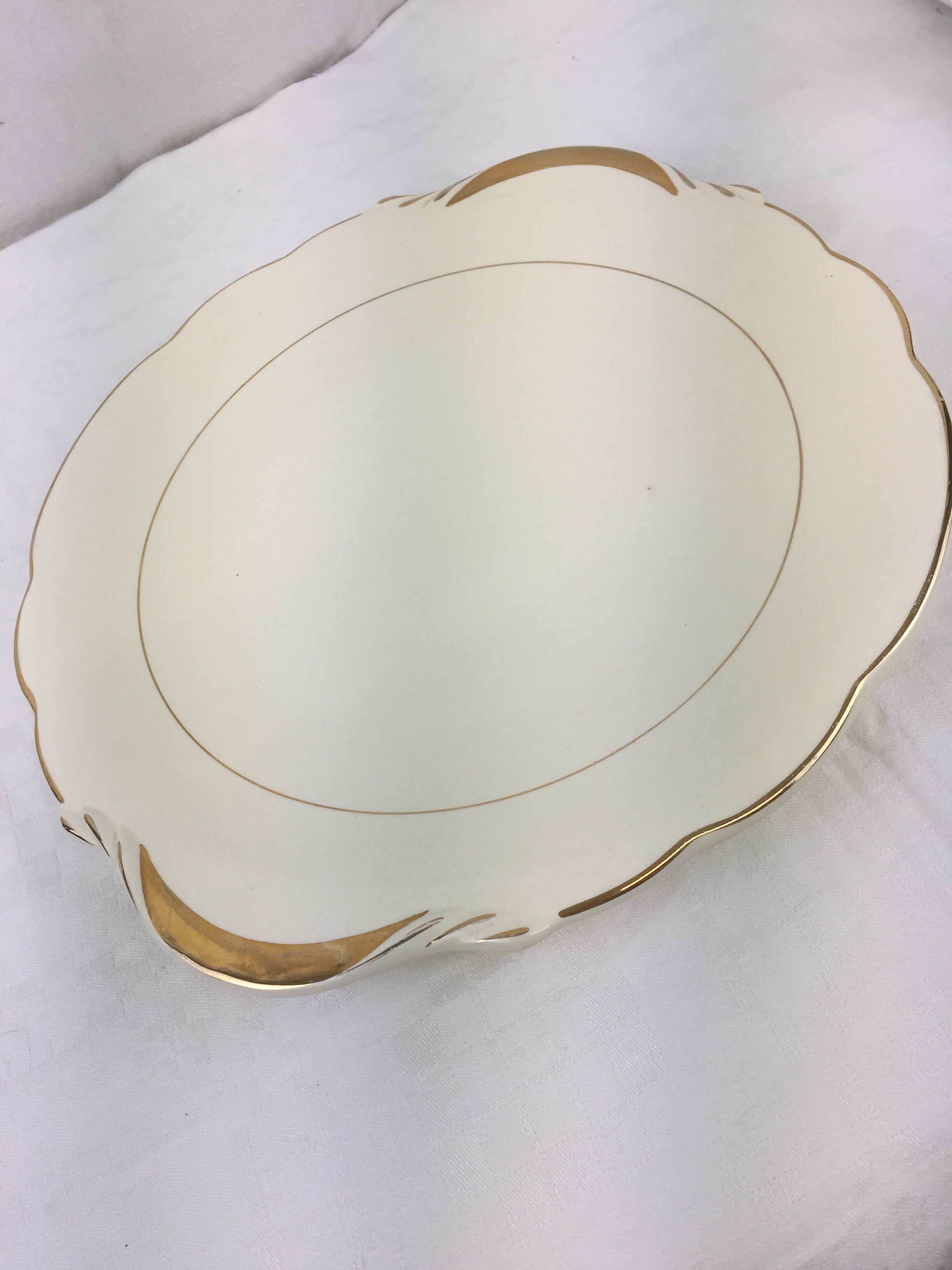 Antique round dish with handles, ivory and gold colored porcelain, made in France Sarreguemines Digoin