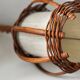 Turned wood lamp.