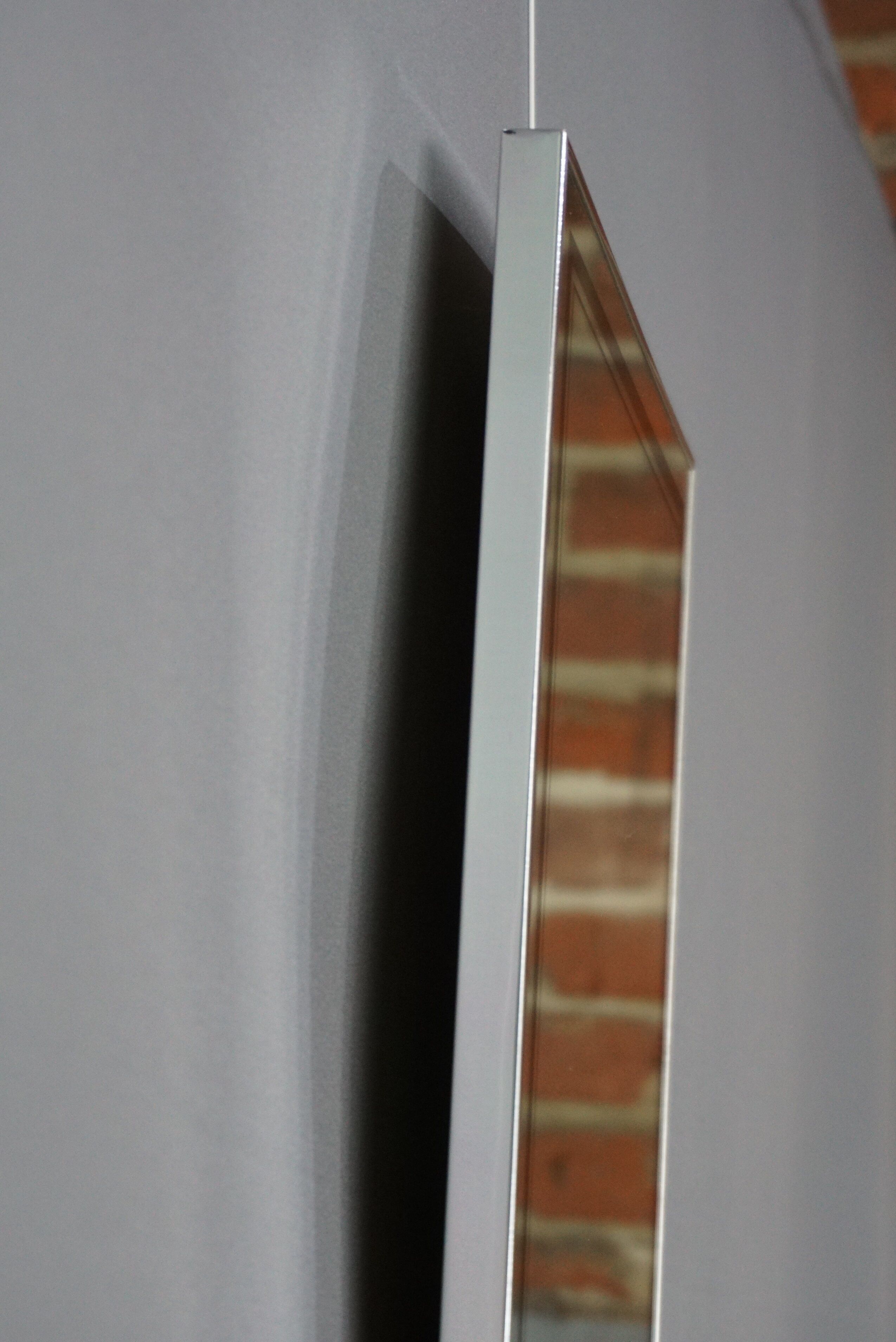 Chrome and screen-printed Deknudt mirror