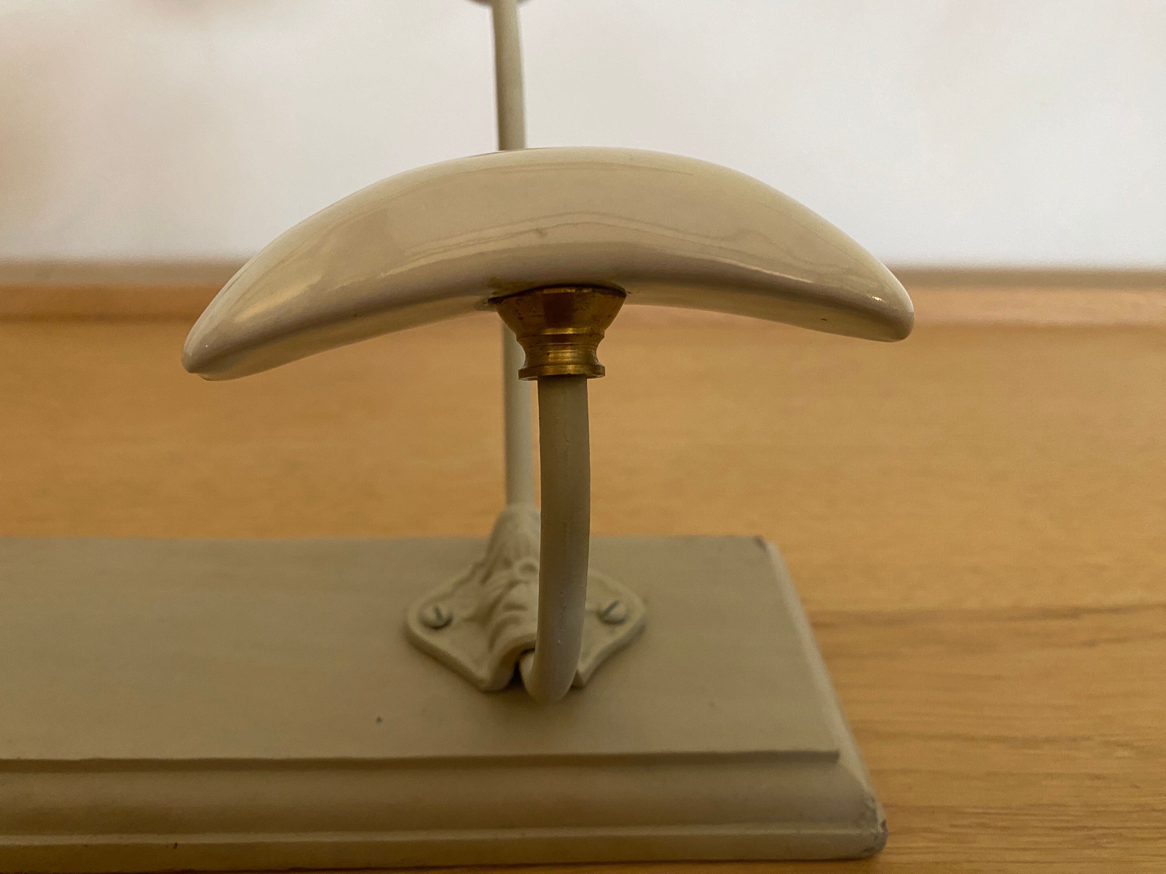 Wall-mounted coat rack with ceramic