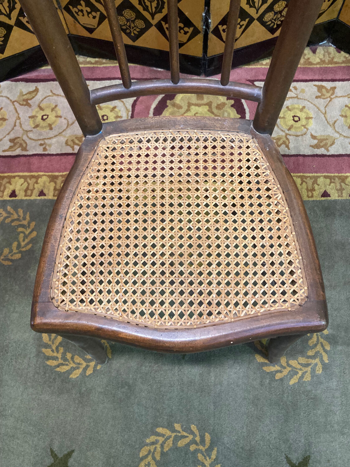 4 tanned bistro chairs