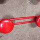 Set of 4 red metal coat hooks