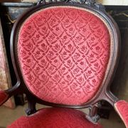 Napoleon III medallion armchair in carved wood and red velvet.