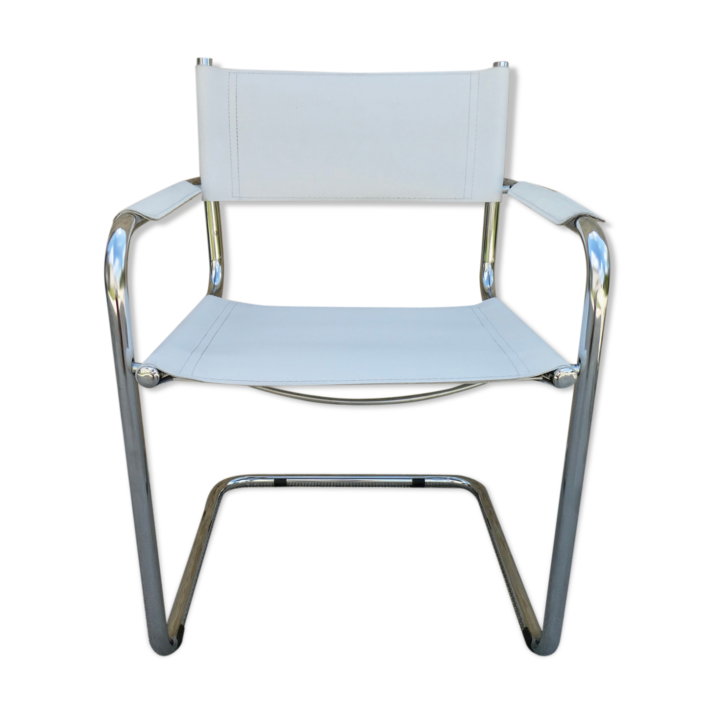 Armchair in chrome and leather