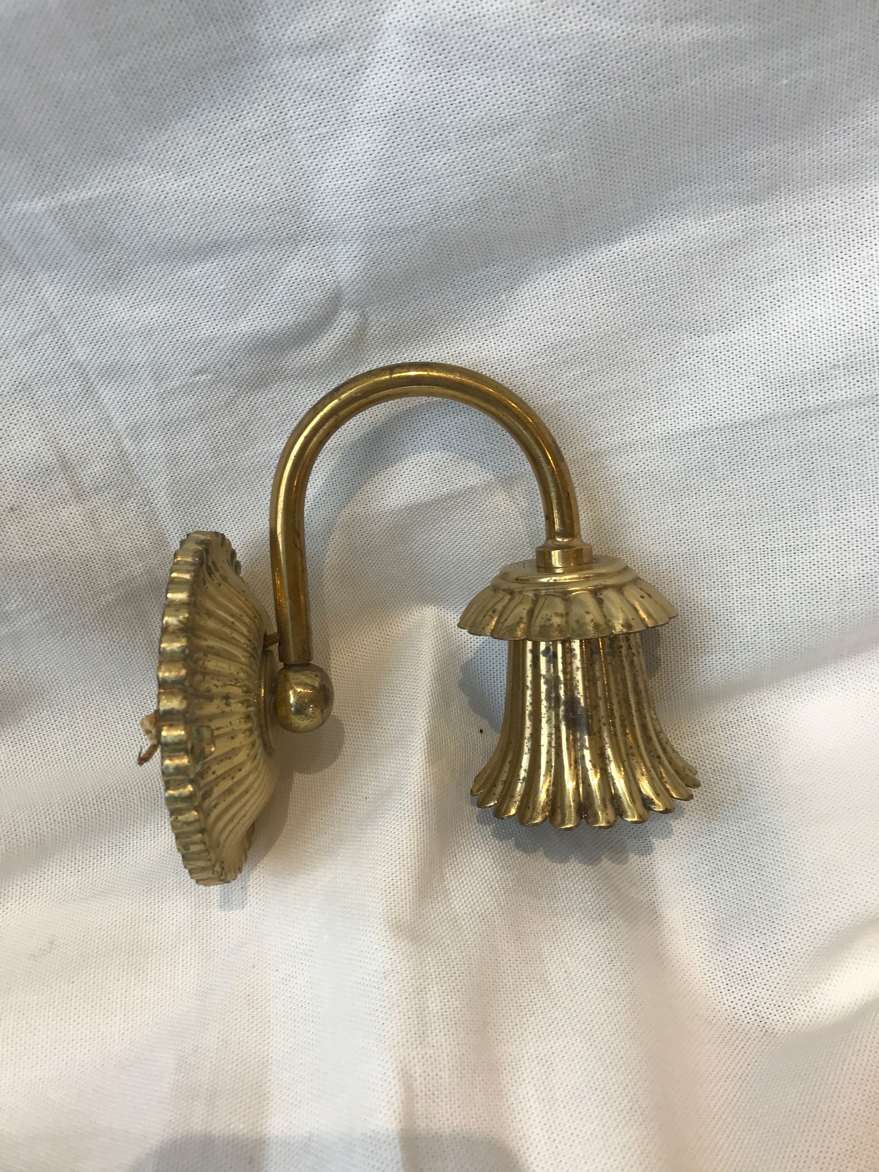 Pair of golden wall light