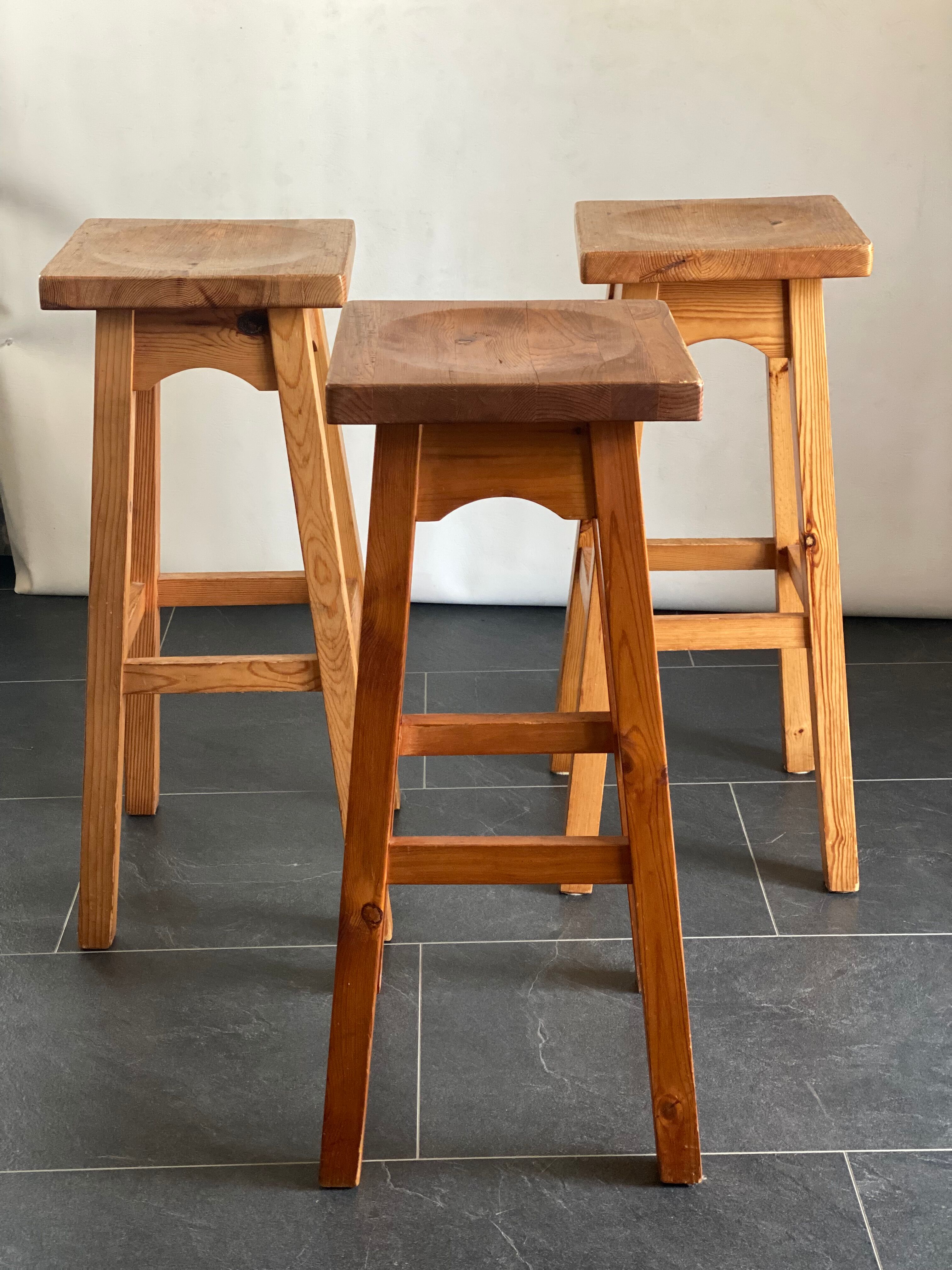 Trio of vintage pine wood bar stools