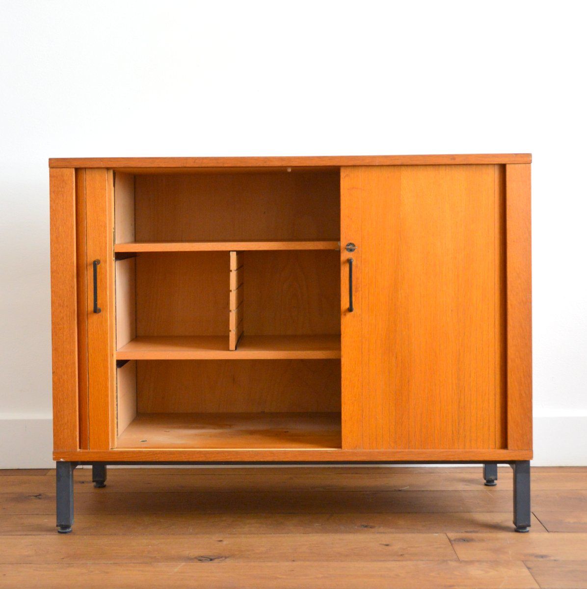 Storage cabinet with sliding curtain shutter 1950s