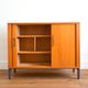 Storage cabinet with sliding curtain shutter 1950s