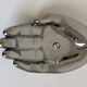 Empty silver chromed ceramic pocket in the shape of a large hand, 1980