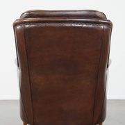 Vintage sheepskin armchair in a dark cognac colour with a comfortable seat