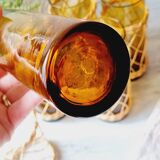 Carafe and glasses in blown amber glass and wicker