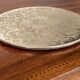 Silvered metal table mat