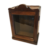 Curiosity showcase in teak