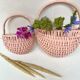 Vintage wall pans in woven wicker