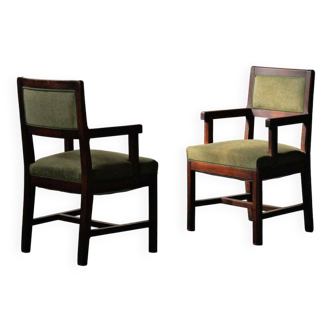 Pair of modernist armchairs in solid oak, France, circa 1940.