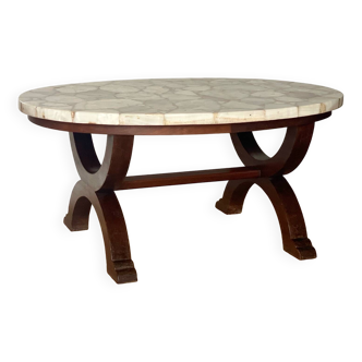 Coffee table in wood, marble and onyx.