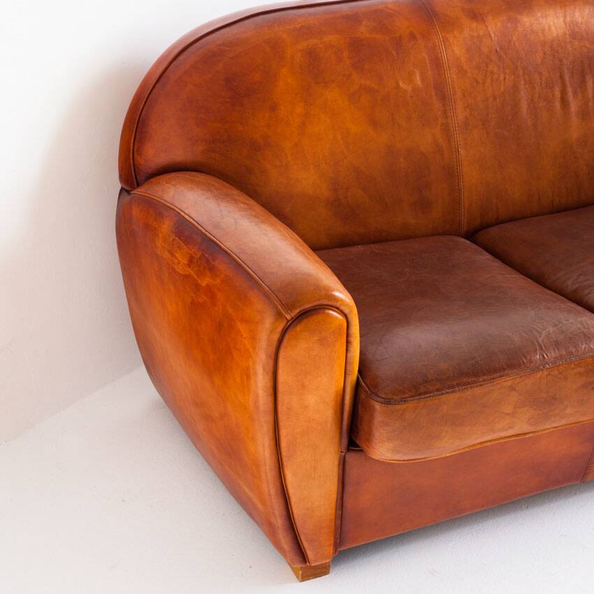 Vintage leather club sofa. Art Deco style. France, 1950s. (sofa convertible into bed)