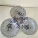 9 Johnson Brothers plates in the Lotus pattern.