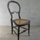 Napoleon III cane chair in blackened wood and mother-of-pearl