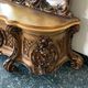 Golden Rococo-style mirror with chest