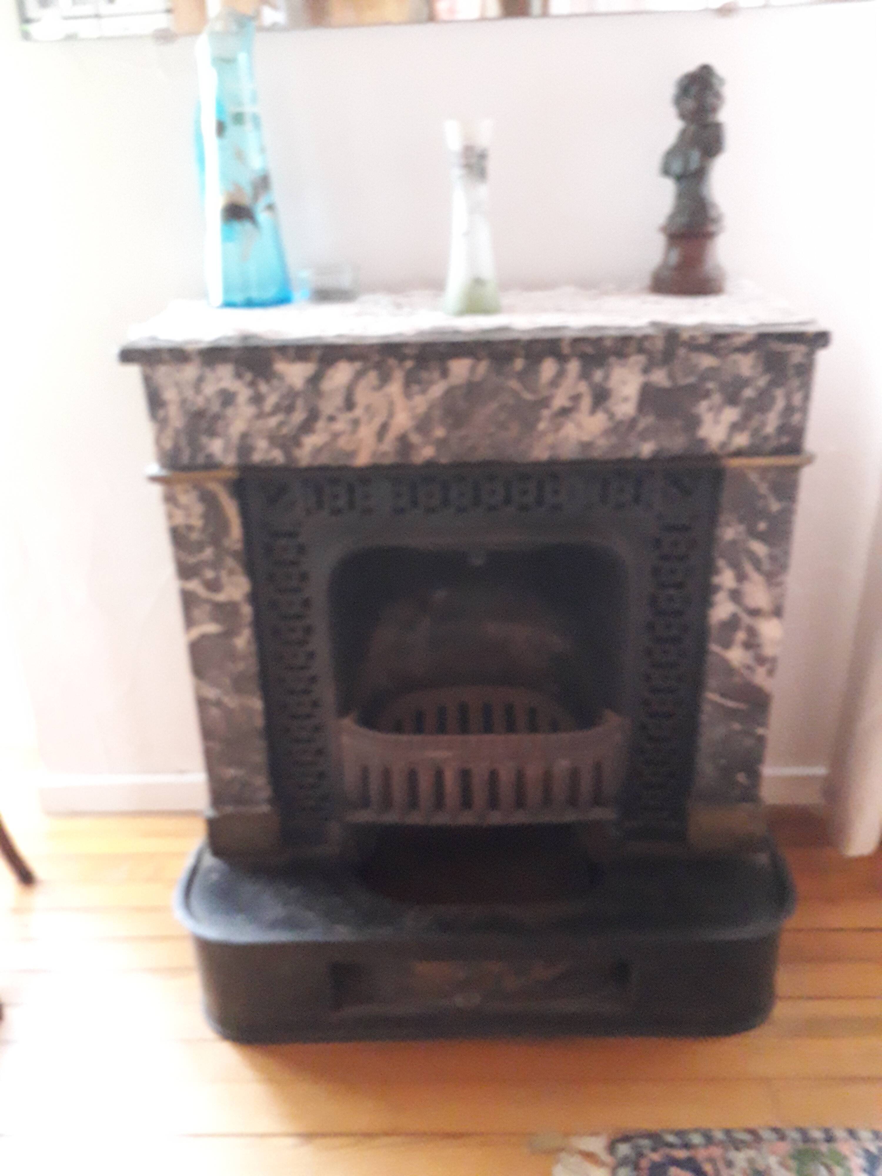 Old black marble fireplace