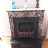 Old black marble fireplace