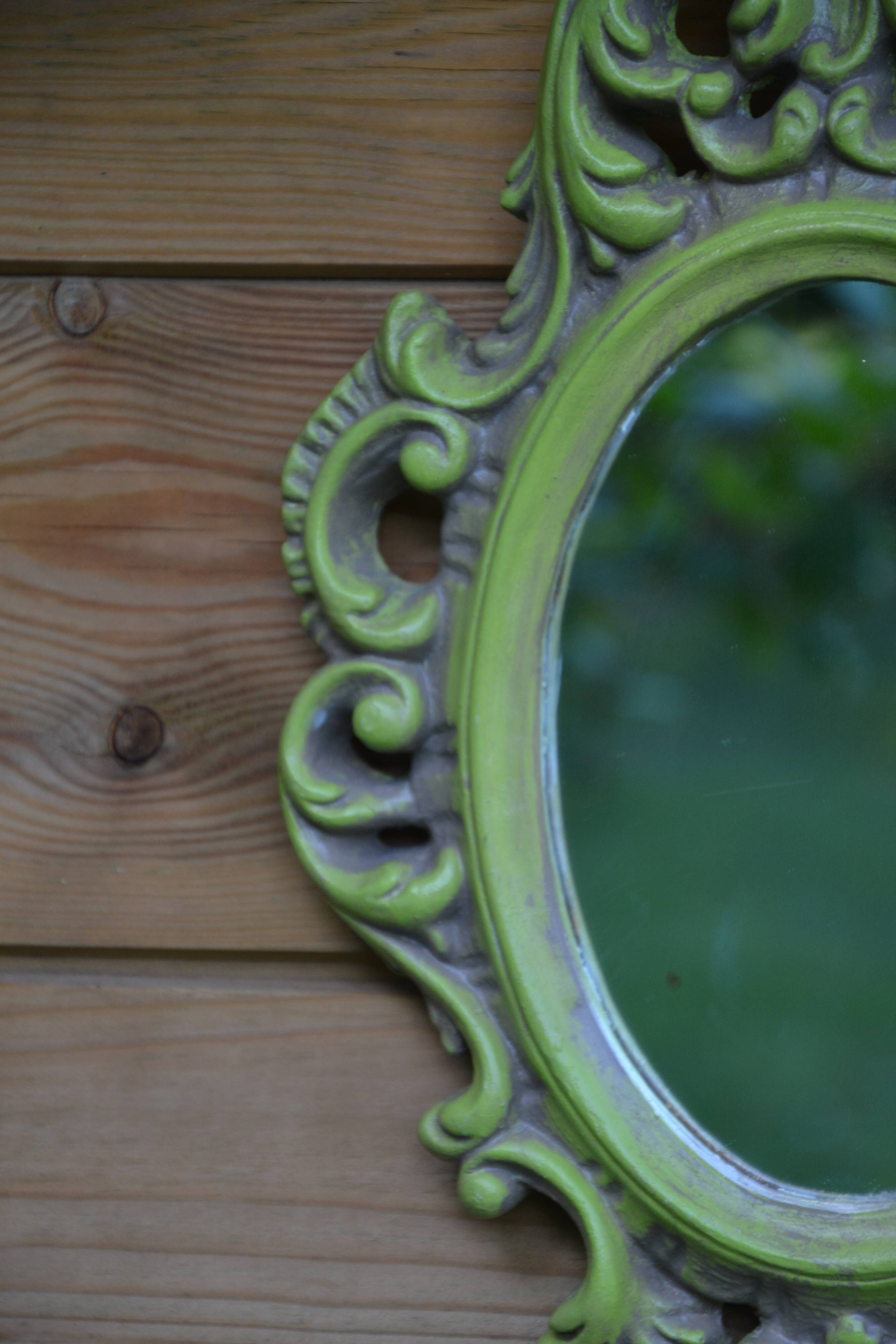 Small green wooden mirror